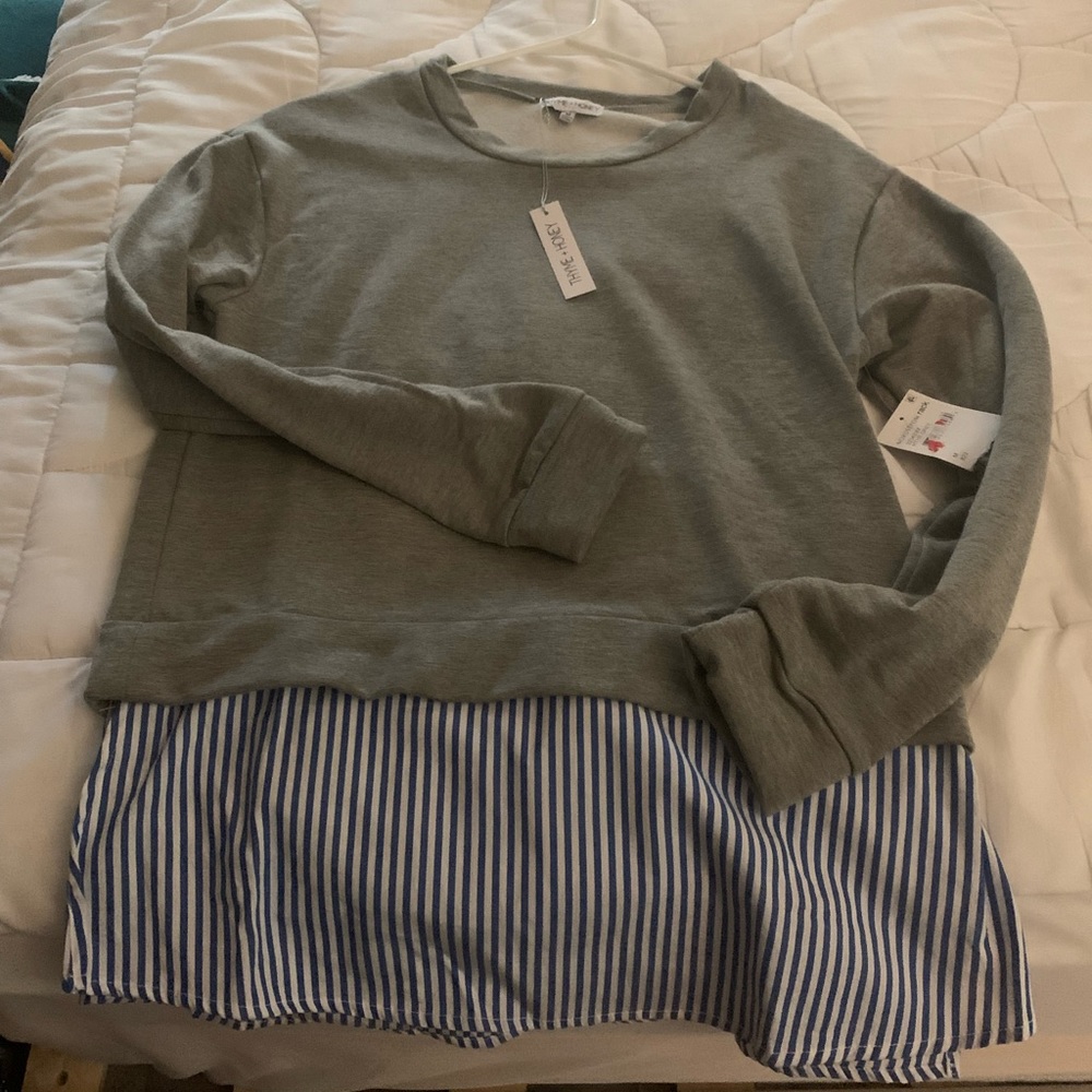 Woman’s sweatshirt top